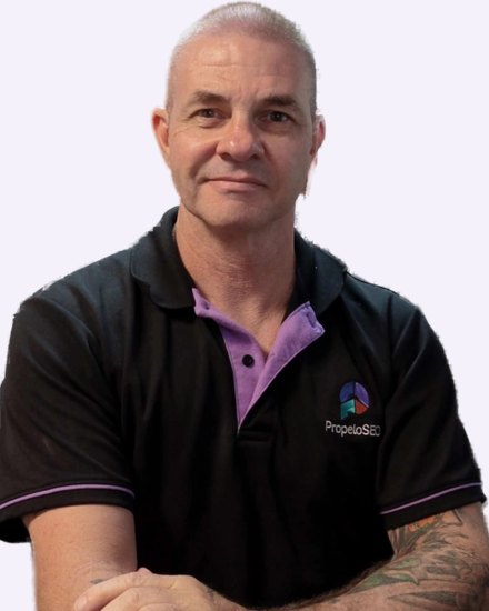Shane Hellmrich, founder of PropeloSEO, in a black PropeloSEO polo